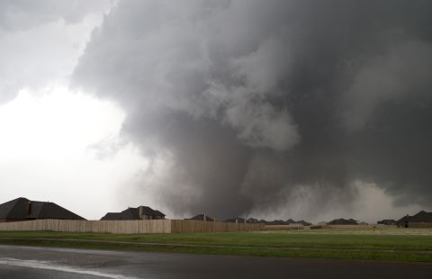 A massive tornado approaches Moore on May 20. The storm first touched down to the west of the city near Newcastle, Oklahoma. Visit <a href="http://www.cnn.com/SPECIALS/impact.your.world/">CNN.com/impact</a> for ways to help the victims.