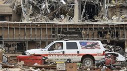 Image #: 22428027    A fire official drives through the rubble of Moore Medical Center after a tornado struck Moore, Oklahoma, May 20, 2013. A 2-mile-wide (3-km-wide) tornado tore through the Oklahoma City suburb of Moore on Monday, killing at least 51 people while destroying entire tracts of homes, piling cars atop one another, and trapping two dozen school children beneath rubble. REUTERS/Gene Blevins (UNITED STATES - Tags: ENVIRONMENT DISASTER)       REUTERS /GENE BLEVINS /LANDOV