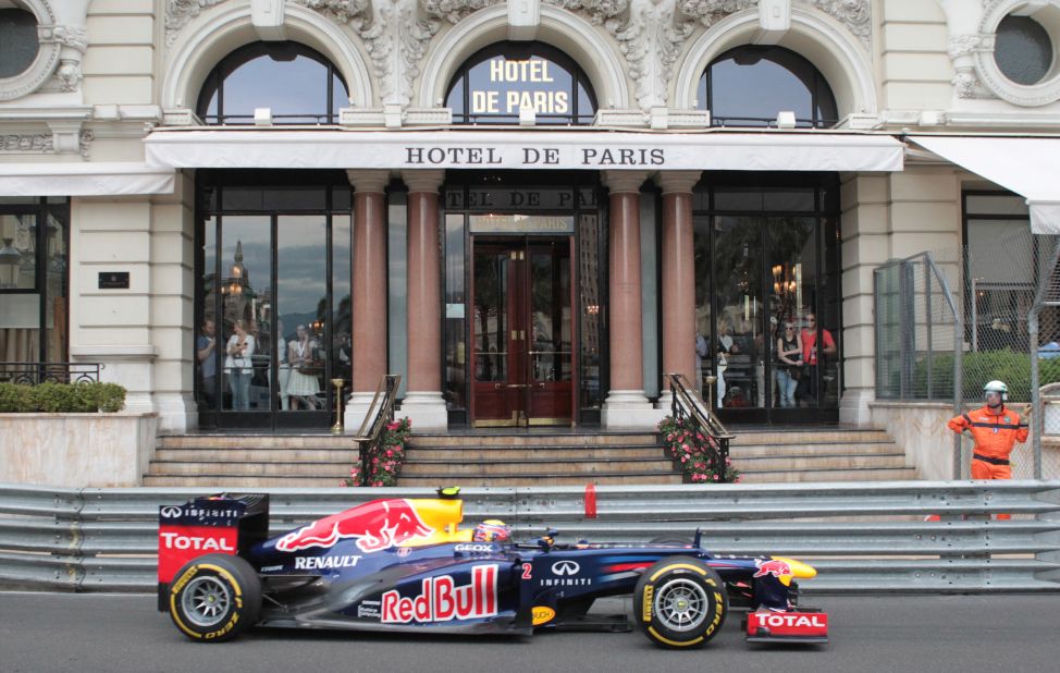 The racing drivers -- like Red Bull's 2012 winner Mark Webber shown here -- speed within inches of  Monte Carlo's famous landmarks.