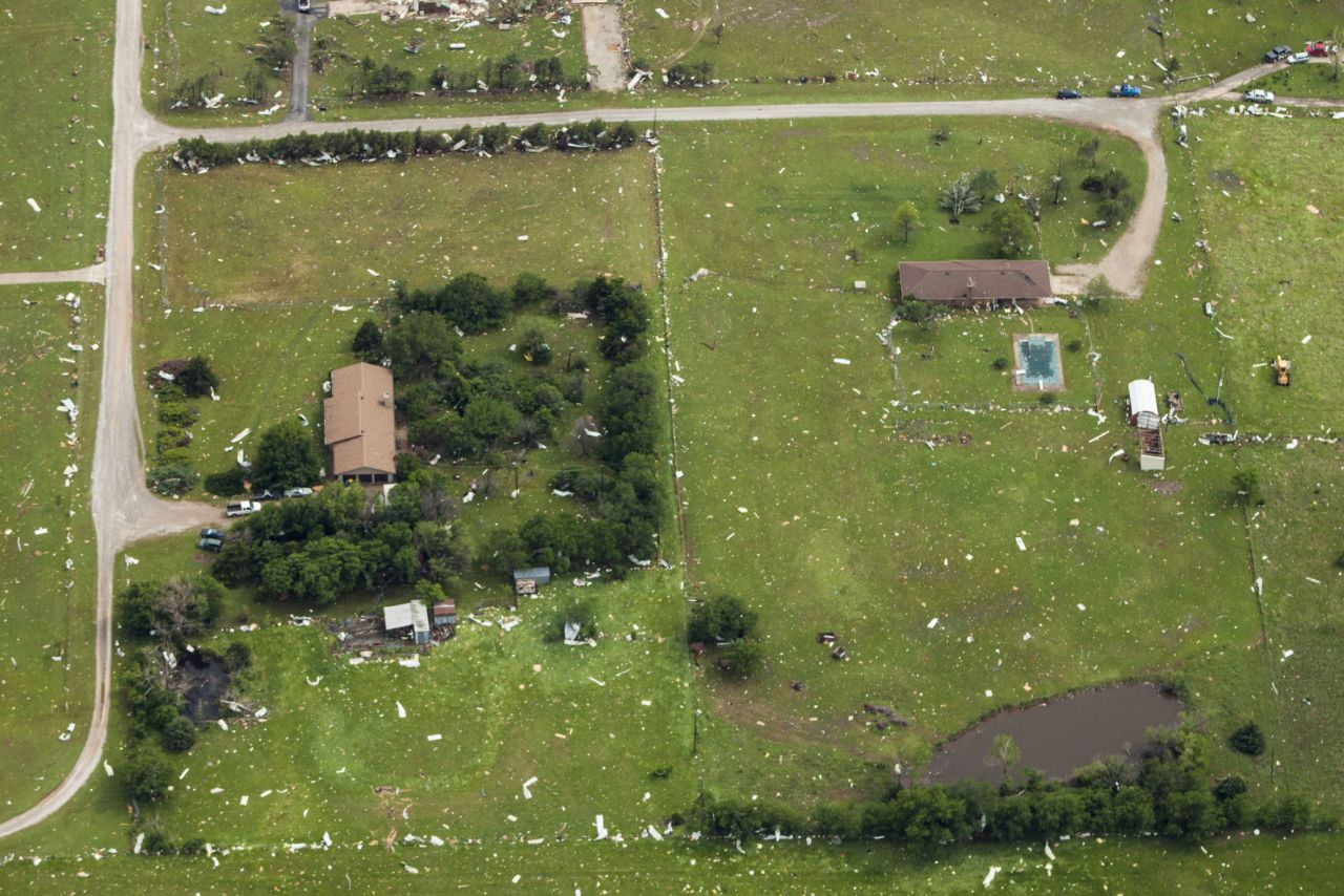 Debris from homes and structures was strewn for miles around. 
