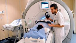 A patient prepares to undergo a MRI  