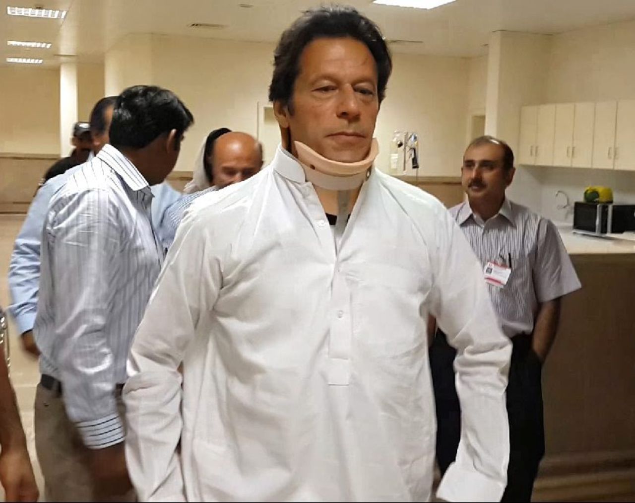 Imran Khan, head of Pakistan's Tehreek-e-Insaf party, leaves the hospital in Lahore, Pakistan, on Wednesday, May 22. Khan suffered spinal fractures and a head injury when he toppled from a forklift that was raising him up to a stage as he campaigned in Lahore for elections held on May 11. Victory in the elections went to Nawaz Sharif, a two-time former prime minister, and his party, the Pakistan Muslim League.