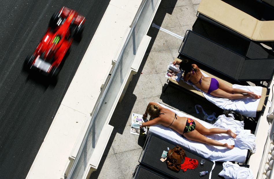 But for some sun-seekers in Monaco, the cars are a distraction...