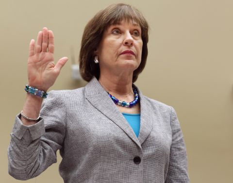 Lois Lerner is sworn in before testifying to the House Oversight and Government Reform Committee in May 2013.  As the former IRS director of exempt organizations, Lerner headed the division involved in targeting conservative groups. She invoked her constitutional right against self-incrimination and refused to answer questions from the congressional committee.