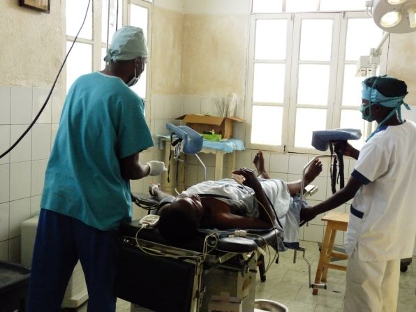 Doctors and staff at HEAL Africa explain to a patient what to expect as they prepare her for fistula surgery.