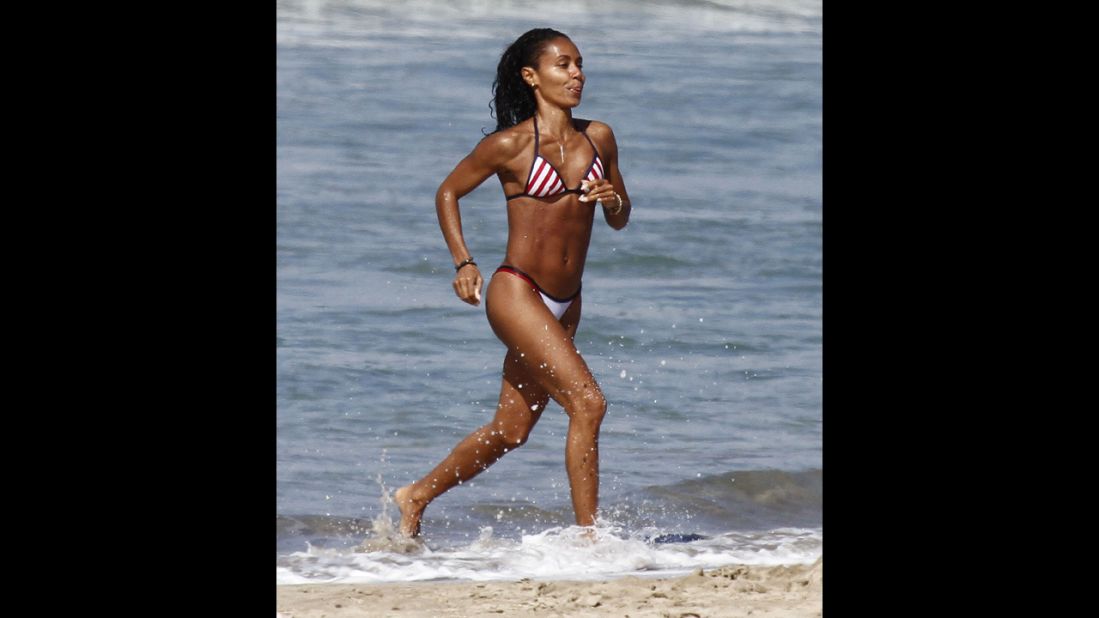 Jada Pinkett Smith shows off her athletic figure at the beach in Kauai, Hawaii, in November 2012.