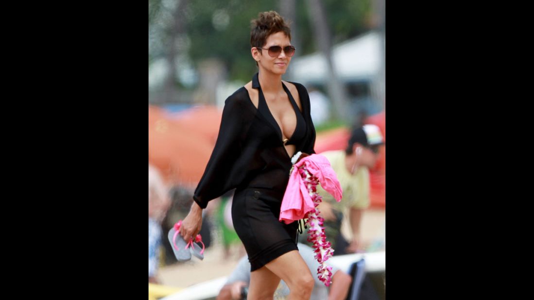Mommy-to-be again Halle Berry headed to the beach in Hawaii with her fiance, Olivier Martinez, and her daughter, Nahla, in March 2013.