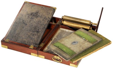 This portable copying press was devised by legendary English steam-engine inventor James Watt. The copying apparatus, consisting of metal damping box, pressure plate and special moistened copying paper, was housed in an elegant brass-bound mahogany box.