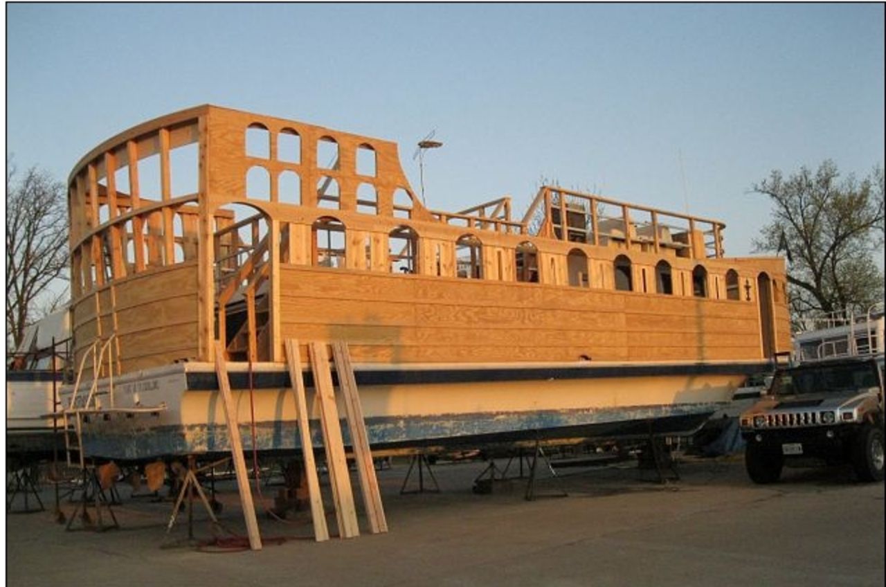 Woodson uses old house boats as the base for his pirate ships, covering them in planks of wood and staining it in varnish to "make it look like something from 1689."