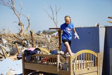 Casey Angle walks on the bunk bed she shared with her sister Sydney, who was among the students killed at Plaza Towers Elementary School during the tornado.