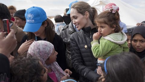 Jolie meets with refugees at the Zaatari refugee camp outside of Mafraq, Jordan, on December 6, 2012, in this handout image provided by the United Nations High Commissioner for Refugees.