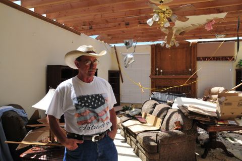 George Stanley recorded the tornado on his iPhone before waiting out the storm in his neighbor's underground storm shelter. He doesn't plan to leave. "It's my paradise out here," he said.