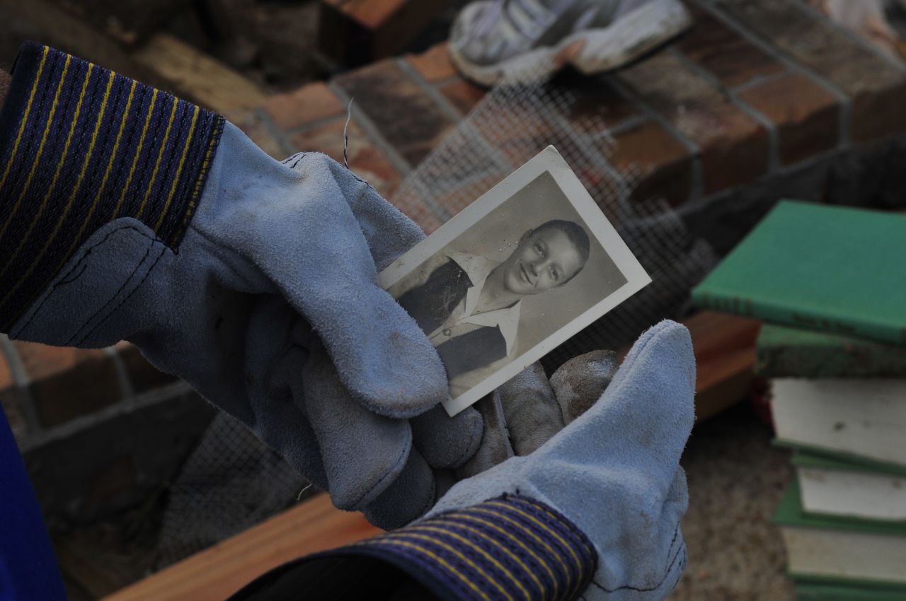 Residents talked about how they survived this storm and the 1999 tornado as they pulled photos and other personal belongings from their homes.