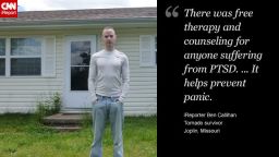 Ben Callihan stands in front of his Joplin home.