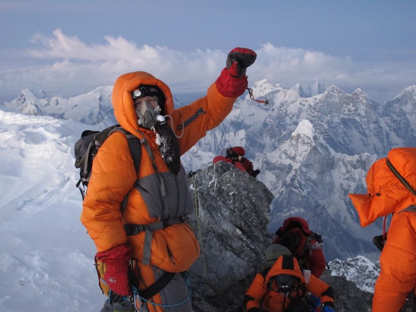Sandra LeDuc captured this photo of a triumphant and relieved Jon Kedrowski reaching the summit of Mount Everest on May 26, 2012.