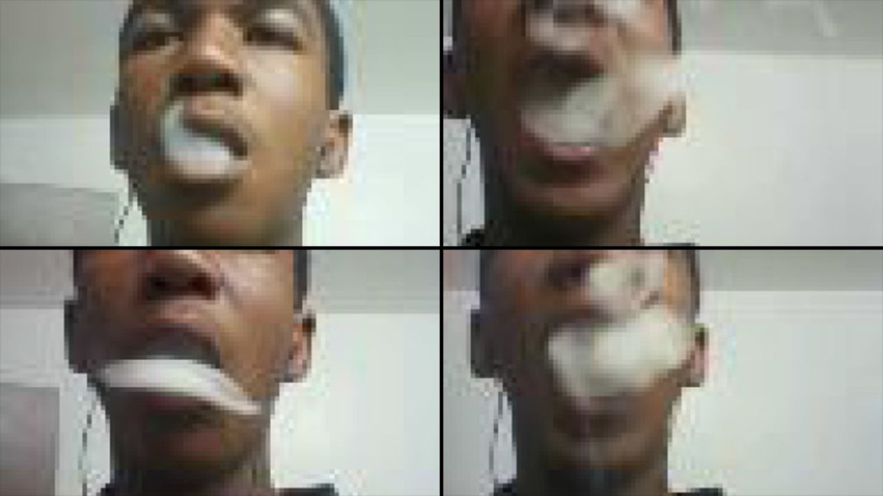Smoke escapes from Martin's mouth in this series of images taken from his cell phone.