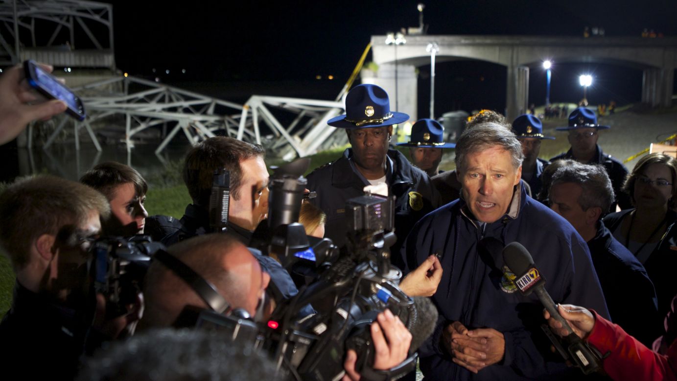 Washington Gov. Jay Inslee addresses the media at the scene of the bridge collapse on May 23.