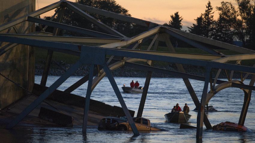 Search and rescue boats comb the water for victims after the collapse on May 23.