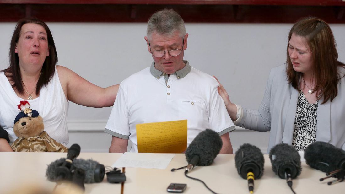 From left, Lyn Rigby, mother of the slain soldier, stepfather Ian Rigby and Lee's wife Rebecca Rigby grieve as Ian reads a family statement on Friday, May 24, in Bury, England.