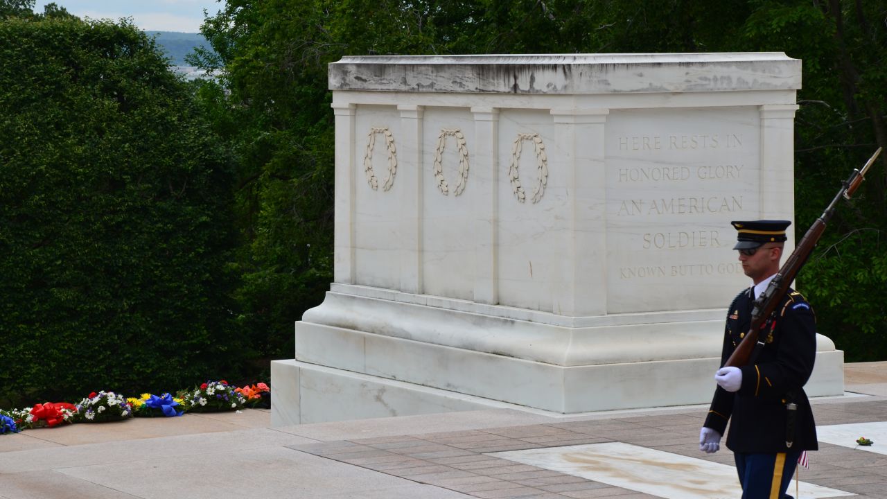 A solitary soldier guards the Tomb of the Unknowns at Arlington National Cemetery. President Barack Obama will participate in a wreath-laying ceremony there on Monday.
