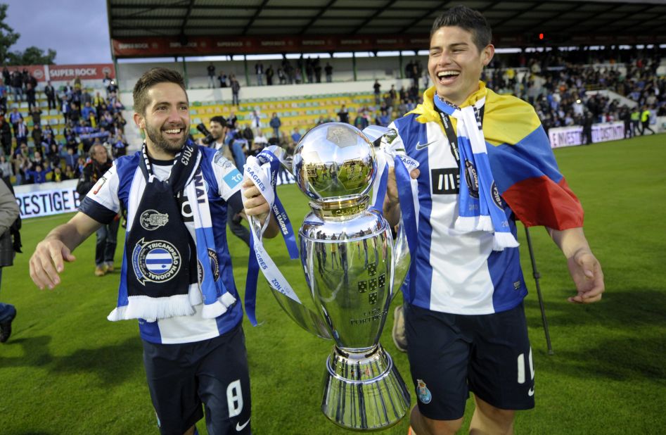 Rodriguez joins Real from French club Monaco, where he spent just one season after signing in a $60 million deal from Porto in May 2013. Here Joao Moutinho, who Monaco signed at the same time as the Colombian, and Rodriguez are pictured holding the Portuguese league trophy after Porto's 2013 triumph.