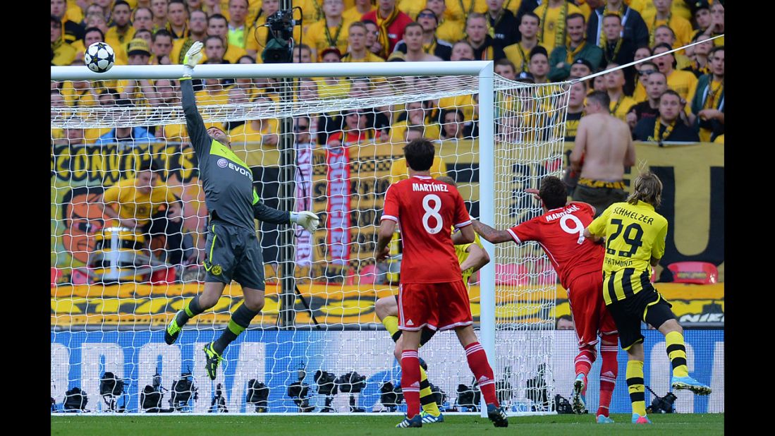 Dortmund's goalkeeper Roman Weidenfeller makes a save against Bayern during the first half.