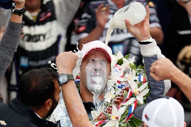 Brazil's Tony Kanaan, driver of the Hydroxycut KV Racing Technology-SH Racing Chevrolet, pours the traditional victory milk over his head after winning the Indianapolis 500 at the Indianapolis Motor Speedway on Sunday, May 26.