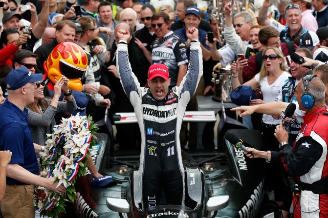 Kanaan celebrates in victory lane. The race featured a record 14 leaders and 68 lead changes