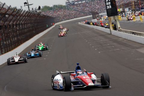 Takuma Sato of Japan, in car No. 14, holds the lead. 