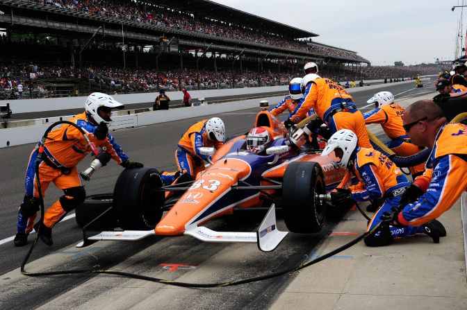 Charlie Kimball, driver of the No. 83 NovoLog FlexPen Honda, makes a pit stop.