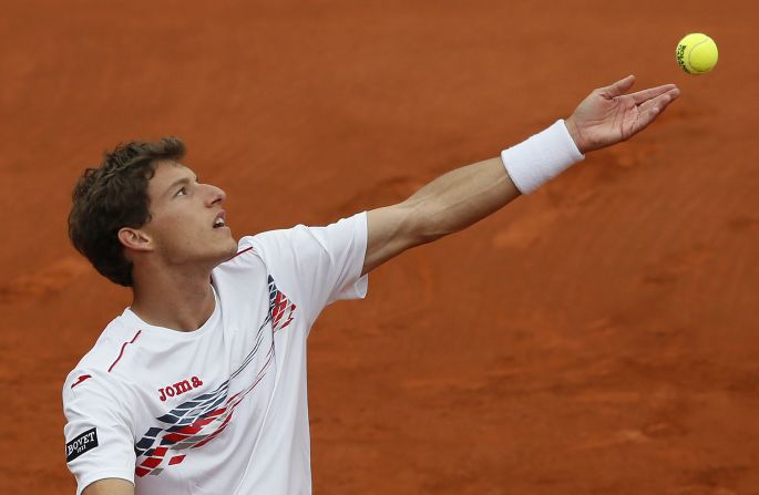  Carreno-Busta serves to Federer on May 26.