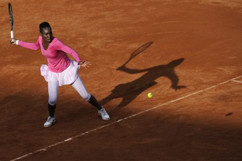 Venus Williams hits a return to Poland's Agnieszka Radwanska on May 26. Radwanska beat Williams 7-6(5), 6-7(4), 6-4.