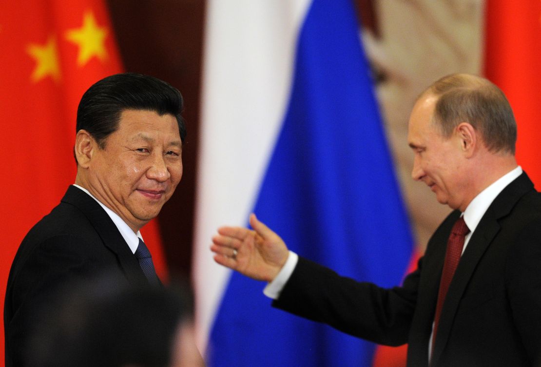 Russia's President Vladimir Putin and China President Xi Jinping signing energy deal on March 22.