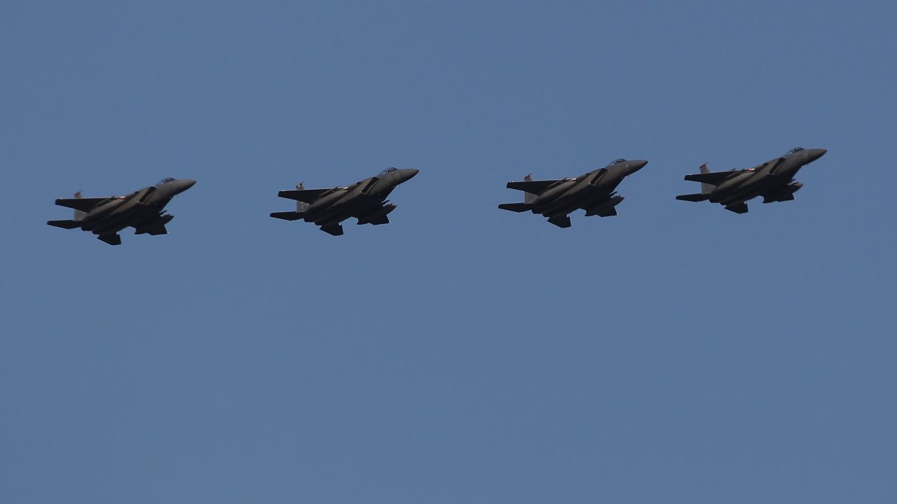 U.S. Air Force F-15 fighter jets fly over Kadena Air Base on February 25, 2010.