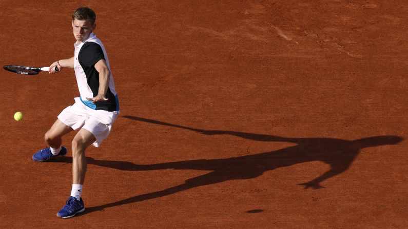 Belgium's David Goffin hits a forehand to Serbia's Novak Djokovic during a first round match of the French Open at Roland Garros Stadium in Paris on Tuesday, May 28.