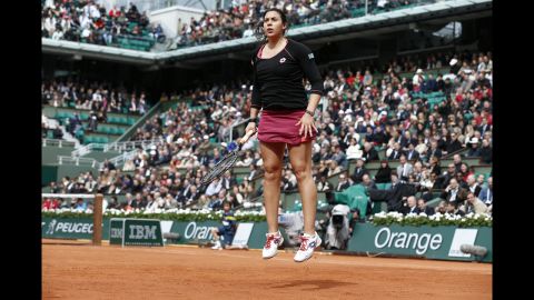 France's Marion Bartoli warms up during her match against Belarus' Olga Govortsova on May 28.