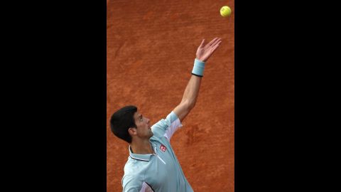 Djokovic serves to Goffin during their first round match on May 28.