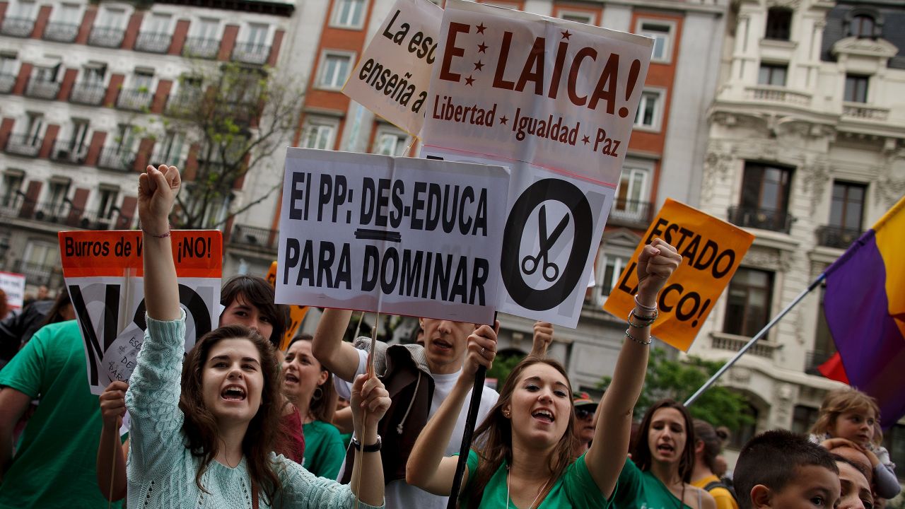 (File photo} Protesters demonstrate against education cuts and reforms on May 9, 2013 in Madrid, Spain.