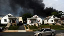 Smoke billows from a train derailment that caused a major explosion in the Rosedale neighborhood outside of Baltimore on Tuesday, May 28. A CSX freight train collided with a commercial truck and derailed leading to an explosion that a witness said could be felt blocks away.