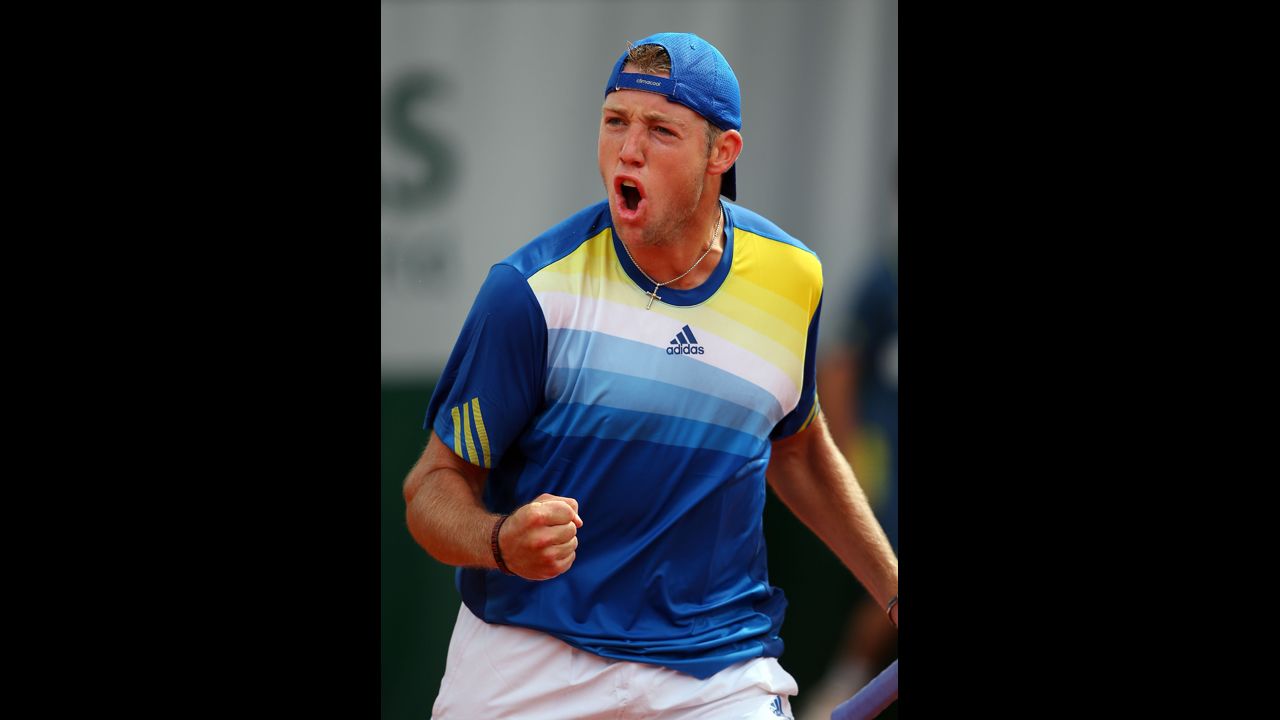 Jack Sock of the United States celebrates beating Guillermo Garcia-Lopez of Spain 6-2, 6-2, 7-5 on May 28.
