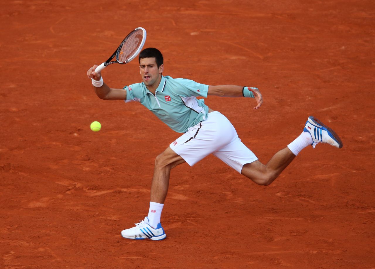 Novak Djokovic of Serbia plays a forehand against David Goffin of Belgium during day three of the French Open at Roland Garros stadium in Paris on Tuesday, May 28. Djokovic defeated Goffin 7-6(5), 6-4, 7-5.