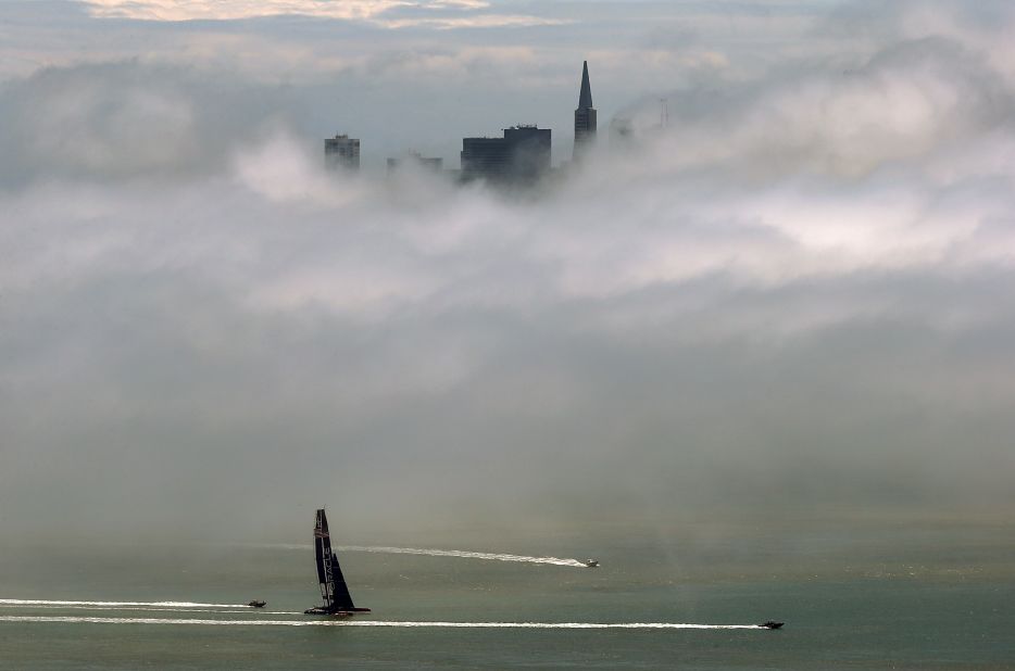 Heavy fog fills San Francisco Bay as seen from Sausalito, California, as the city's skyline struggles to peak through on May 28.