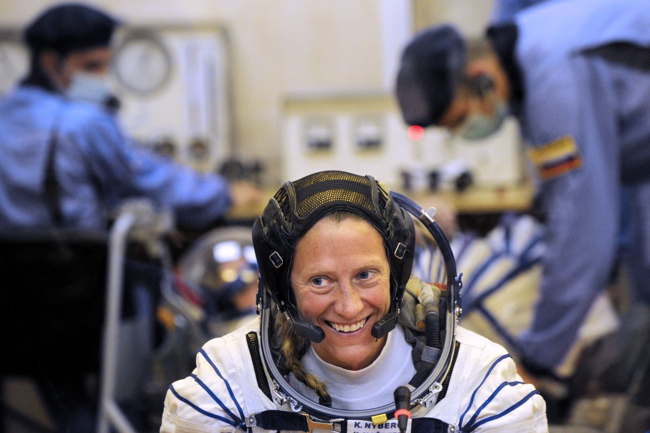 Nyberg smiles during the space suit testing on May 28.