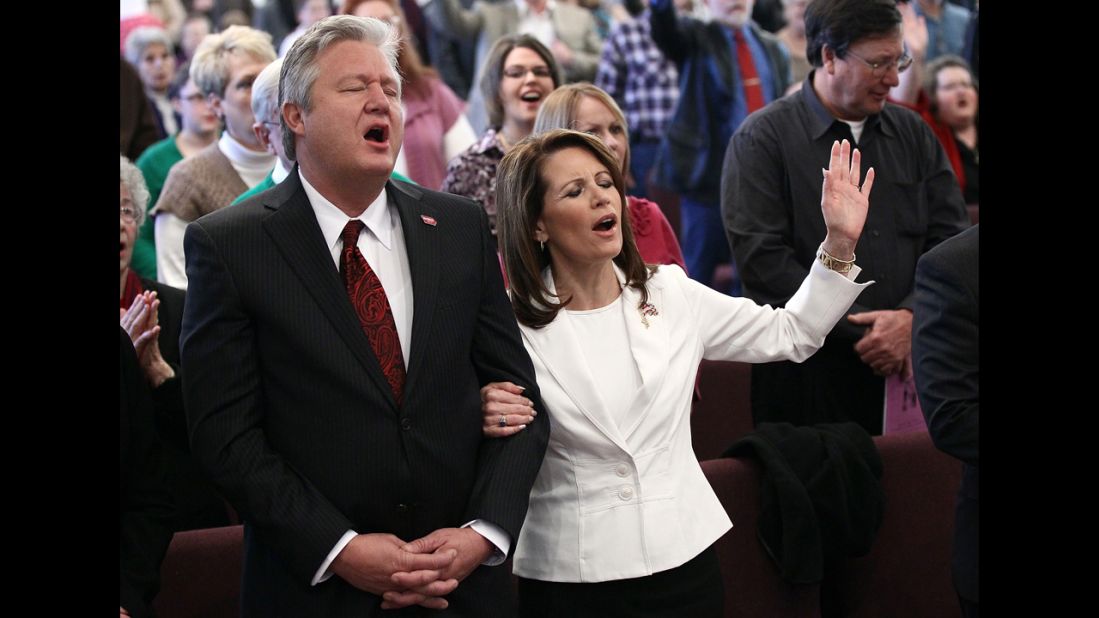 Bachmann and her husband, Marcus, join in the services at the Jubilee Family Church in Oskaloosa, Iowa, in January 2012 as the then-GOP presidential candidate made a final push before the Iowa caucuses.