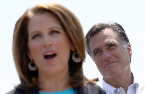 Bachmann endorses Mitt Romney at a May 2012 campaign event in Portsmouth, Virginia. Bachmann ran against Romney for the GOP presidential nomination before dropping out after the Iowa caucuses. 