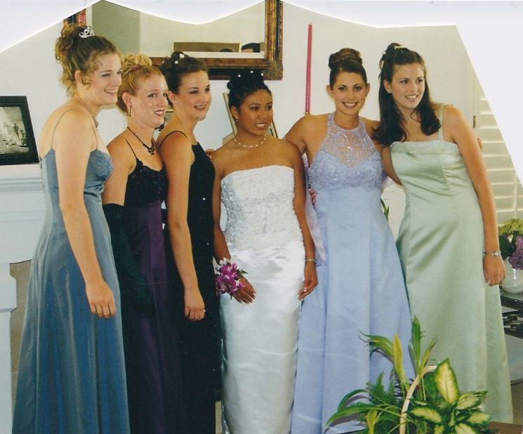 2000: <a href="http://ireport.cnn.com/docs/DOC-605993">Deanne Goodman</a>, in lavender, still really likes her dress, even though she says it's outdated by more than a decade. The friendships with those in the picture haven't faded away either.