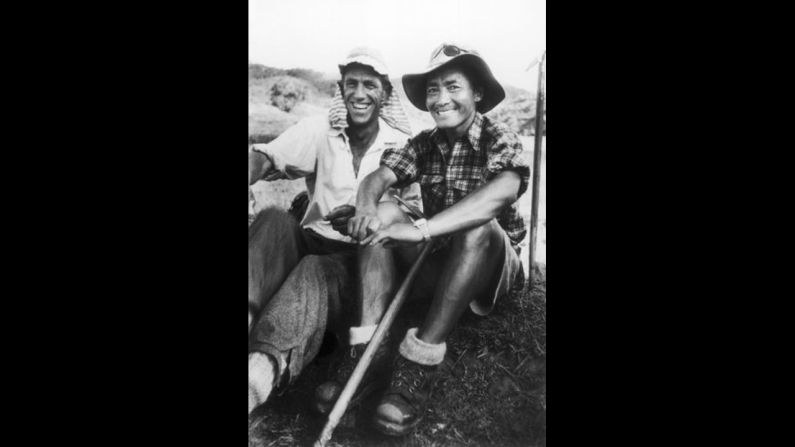 Edmund Hillary and Tenzing Norgay smile after descending from Mount Everest in 1953. The pair were the first climbers to summit the world's tallest mountain.