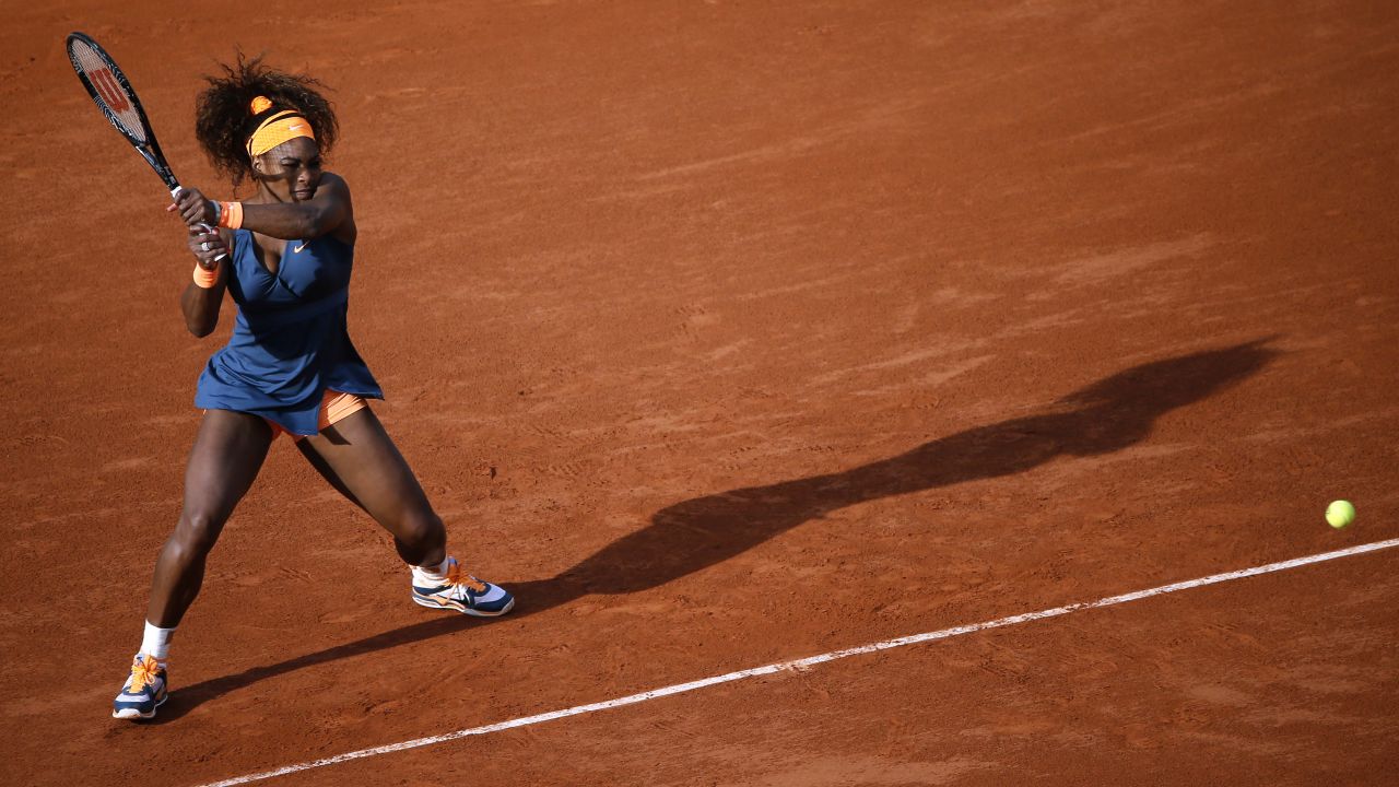 Serena Williams of the United States hits a shot to Caroline Garcia of France on May 29. Williams won 6-1, 6-2.