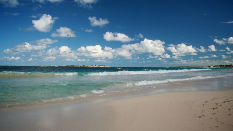 At Orient Bay, you can get naked to a backdrop straight out of a René Magritte painting. 