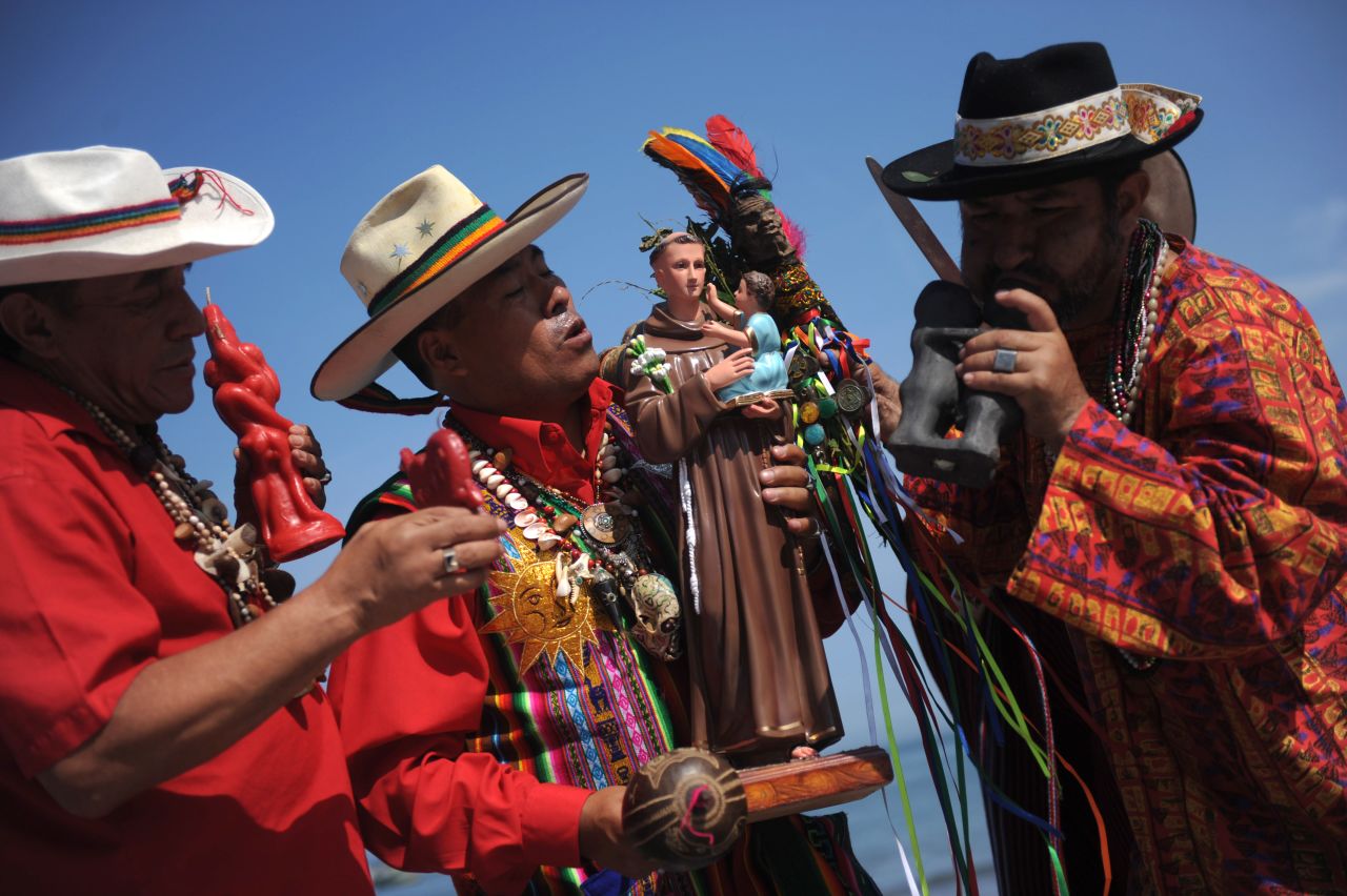 Shamans perform a marriage ritual on Valentine's Day at Agua Dulce, a local beach in Lima.